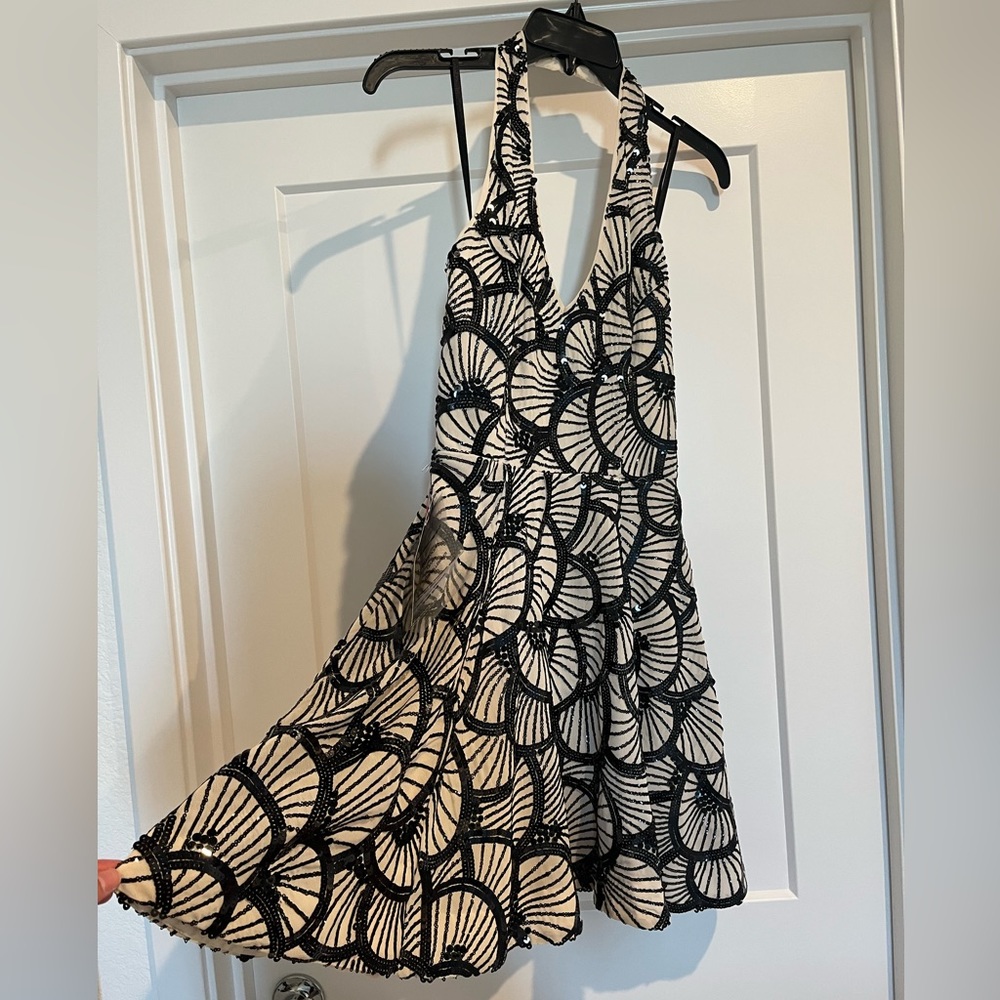 Brand new Bebe black sequin fit and flare xs